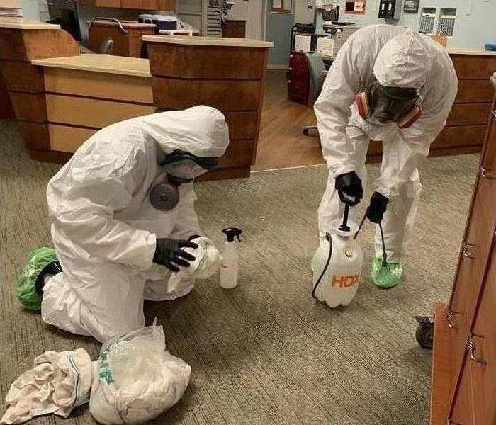 SERVPRO technicians with cleaning gear